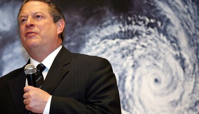 
              FILE - In this Monday, Jan. 15, 2007 file photo, former U.S. Vice President Al Gore speaks in front of a poster for his documentary film on global warming, "An Inconvenient Truth," duri